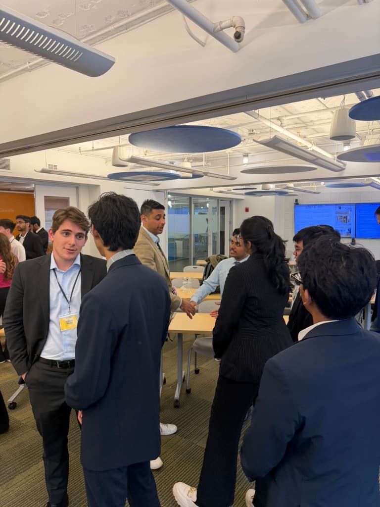 Students networking between sessions
